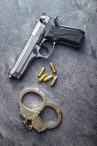 Weapons Crime Fort Lauderdale Criminal Defense Attorney Pistol Bullets Handgun And Handcuffs 1 200x300