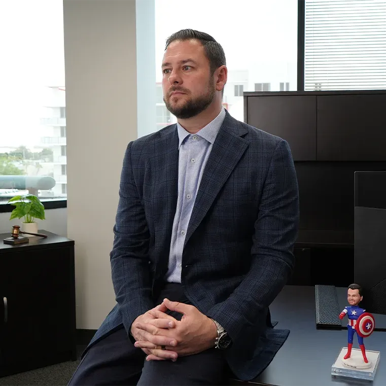 Rossen Law Firm attorney at desk