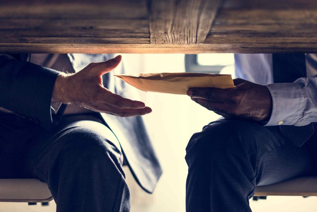 under table deal making a deal under the table