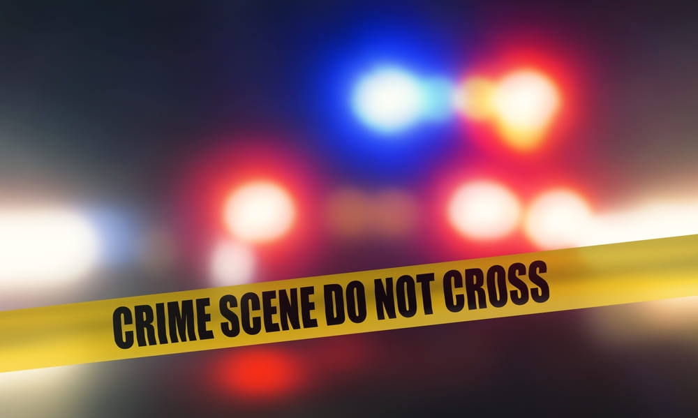 Crime scene tape representing assault charges in Florida criminal case
